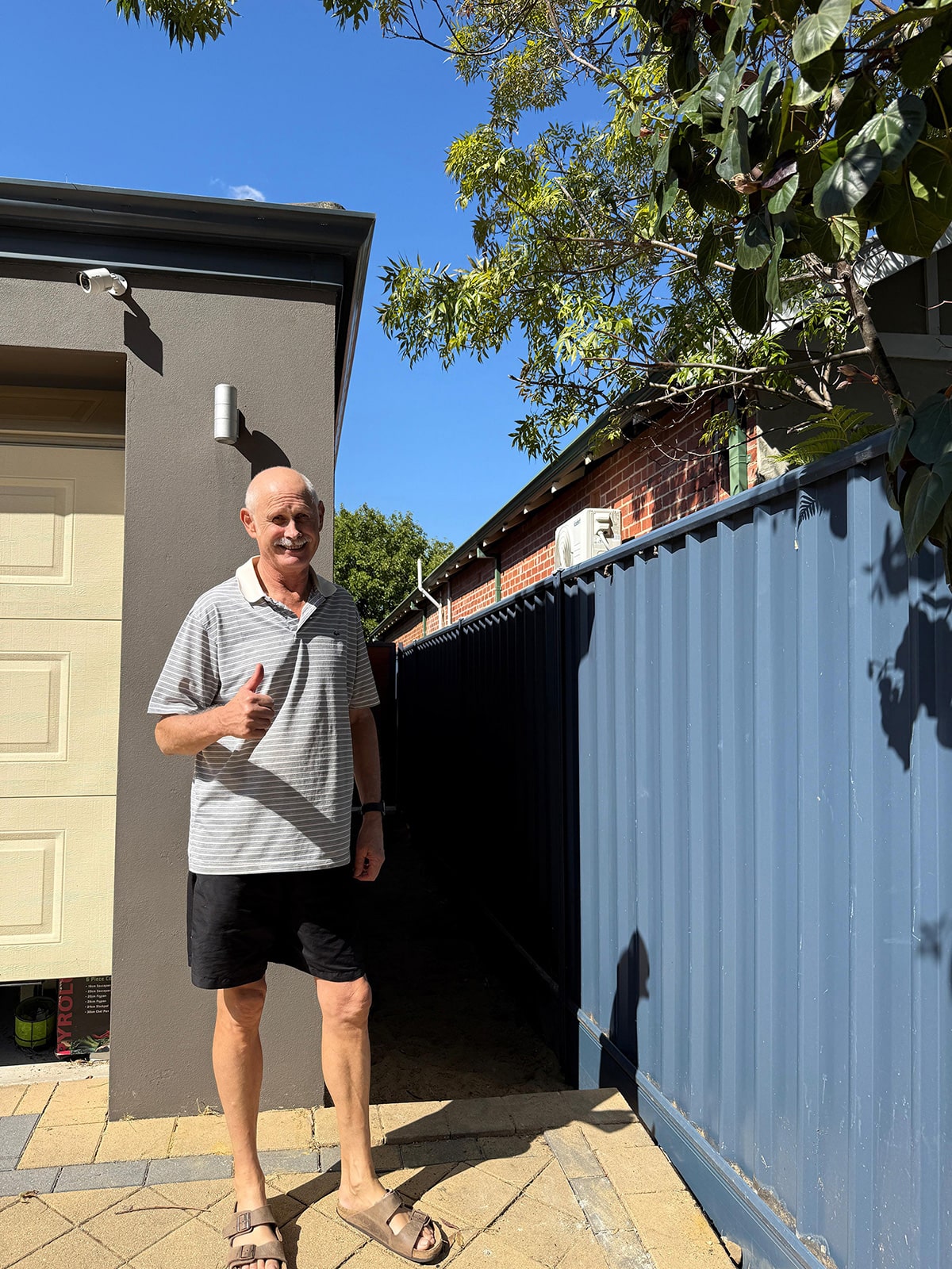 Color-bonded fence with decorative elements